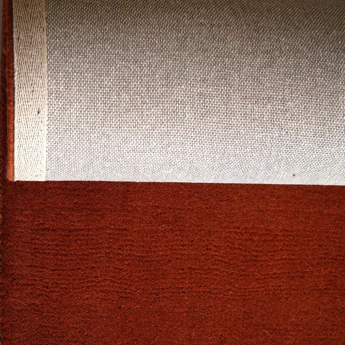 Elegant Hand Tufted Wool Rug in Solid Rust Red