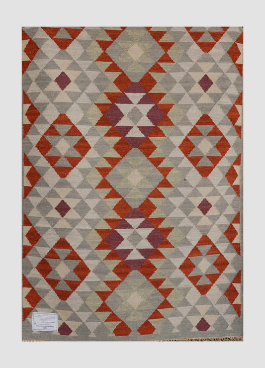 Handwoven Woollen Dhurrie with Geometric Tribal Pattern – Multicolor