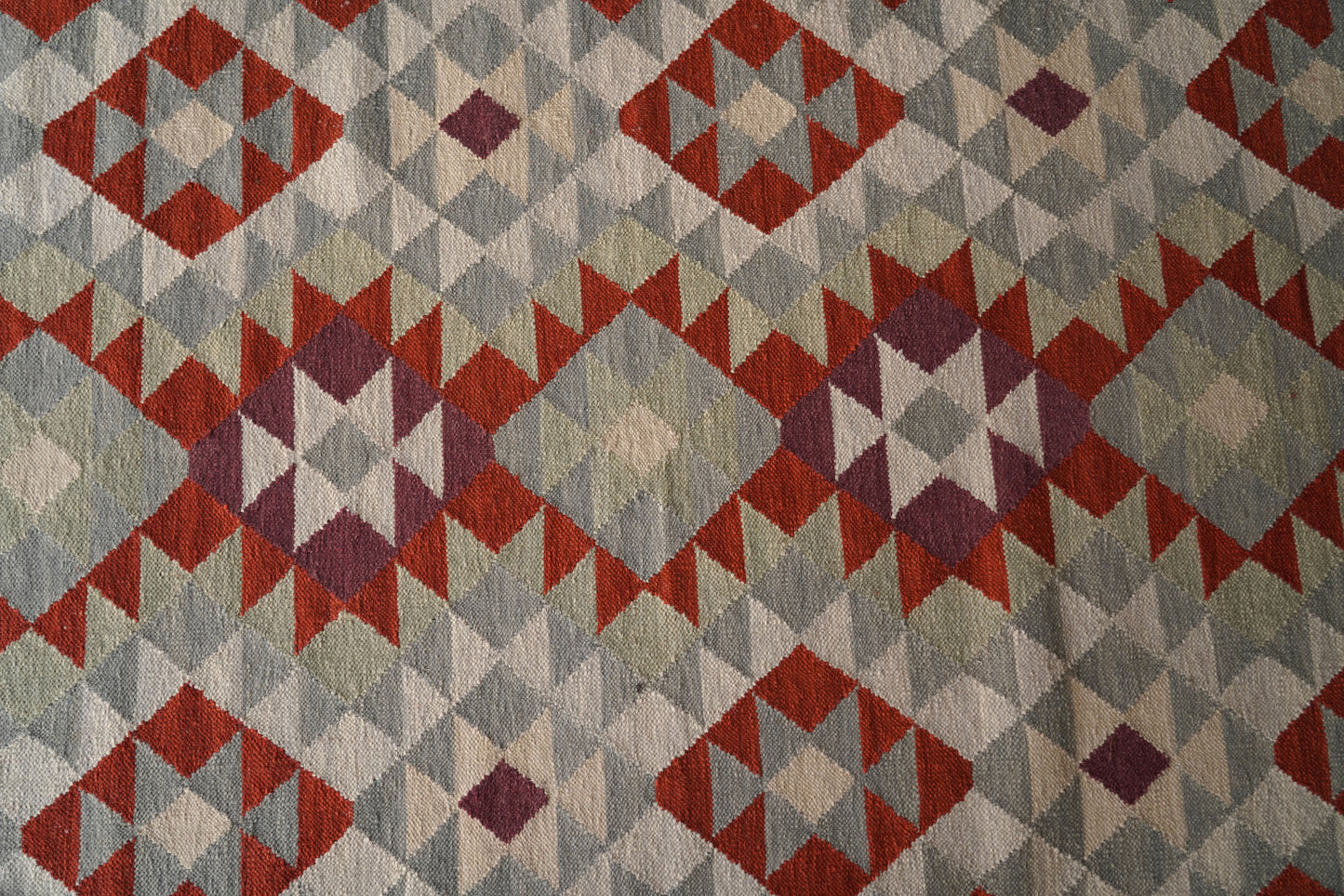 Handwoven Woollen Dhurrie with Geometric Tribal Pattern – Multicolor