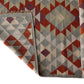 Handwoven Woollen Dhurrie with Geometric Tribal Pattern – Multicolor