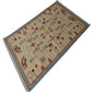 Handwoven Woollen Dhurrie with Geometric & Floral Motifs
